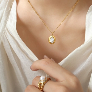 Golden titanium steel necklace with white shell pendant and a pearl ring for women