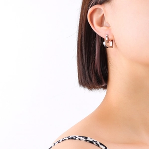 French minimalist silver hollow heart-shaped hoop earrings for women in polished finish