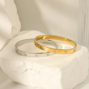 Polished gold and silver stainless steel clover bracelets with sparkling CNC stone inlay