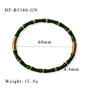 Detail view showing the 60mm inner diameter and 4.4mm width of this bamboo gold bangle