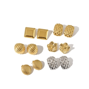 Set of six pairs of gold and silver stainless steel earrings with geometric designs