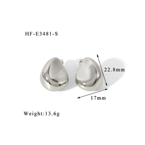 Macro shot of chunky teardrop silver earrings with dimensions 22.8mm height and 17mm width