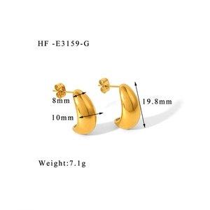 Detailed view of chunky gold teardrop earrings with precise size and weight measurements