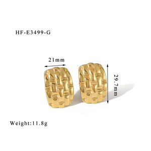 Detail view of gold 18k woven texture earrings with 21mm by 29.7mm dimensions