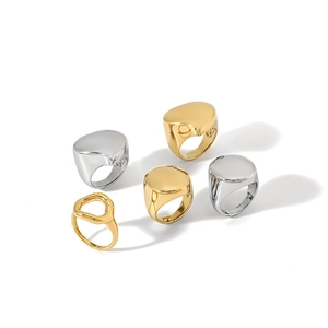 Minimalist 18K gold and silver chunky geometric rings with polished mirror finish