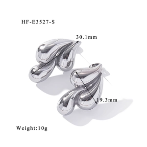 Detailed view of fluid teardrop earrings in polished steel with size and weight info