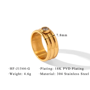 Detail of 18K gold-plated 304 stainless steel triple-layer ring with round cubic zirconia