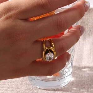 18K gold plated double-band stainless steel ring with oval zircon on a hand
