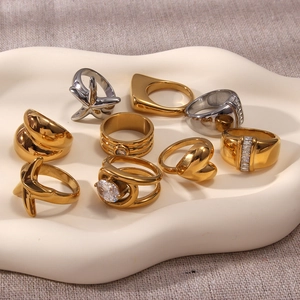 Set of 10 gold and silver plated geometric rings with starfish and heart motifs
