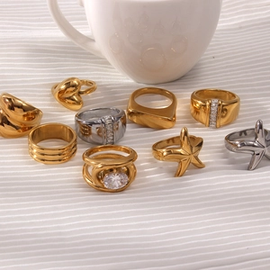 Detailed collection of gold and silver rings with starfish, heart and crystal designs
