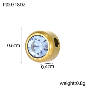 Detail view of gold stainless steel charm with blue rhinestone and 0.6cm size specs