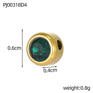 Detail of 0.6cm gold-plated stainless steel bead with green crystal and size markings