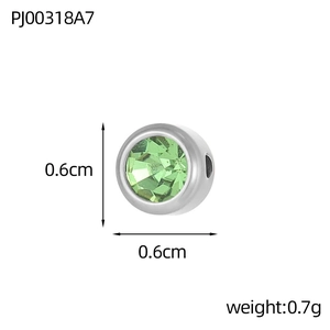 Silver stainless steel charm with emerald green rhinestone and side hole detail