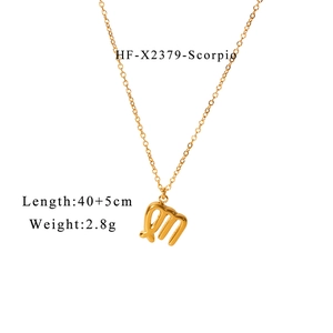 Detail of 18K gold plated Scorpio zodiac necklace with extension chain on white background