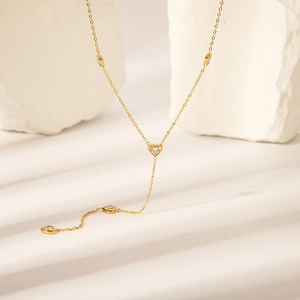 Classic 18K gold-plated Y-shaped heart tassel necklace with zircon stones on stone base