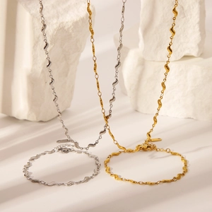 Ensemble de bijoux minimalistes 18K or et argent avec collier et bracelet vague