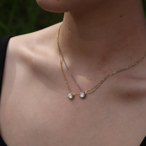Ensemble de colliers minimalistes or et argent avec pendentifs en zircone ronde