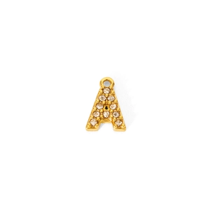 Detailed close-up of 18K gold letter A pendant with shimmering paved zircon stones