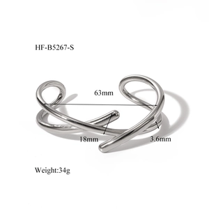 Bracelet jonc croisé minimaliste argenté avec détails des dimensions et du poids