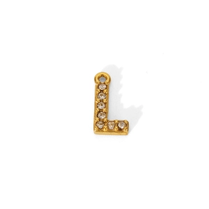 Detailed macro view of a gold-plated letter L pendant with shimmering zircon pavé setting