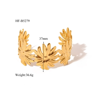 Detailed close-up showing the 37mm height and weight specs of the 18K gold flower cuff bracelet