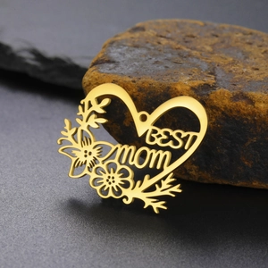 Detailed view of Best Mom heart pendant with hollow flowers in gold plated finish