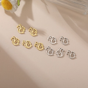 Detailed close-up of squirrel charms in gold and silver finish for DIY jewelry making