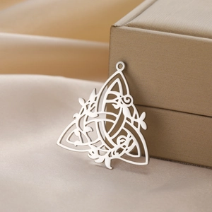 Intricate hollow Celtic knot silver pendant with floral elements for necklace accessory