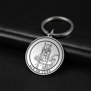 Stainless steel Ace of Cups tarot keychain with silver metallic finish on black leather