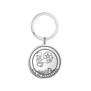 Silver stainless steel tarot keychain featuring Ace of Pentacles design on white background