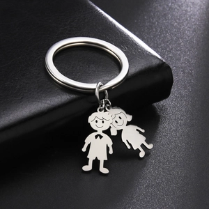 Polished stainless steel keychain with cute cartoon boy and girl charms on black leather