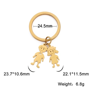 Minimalist gold stainless steel keychain with cartoon boy and girl silhouette pendants