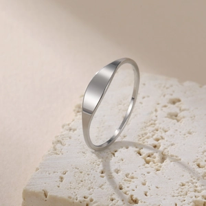 Minimalist 3.8mm polished stainless steel curved ring with flat top on stone base