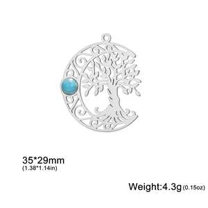 Detail view of 35x29mm hollow moon tree of life pendant with turquoise bead inlay