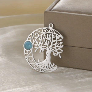 Openwork Tree of Life silver pendant with a round turquoise gemstone inlay