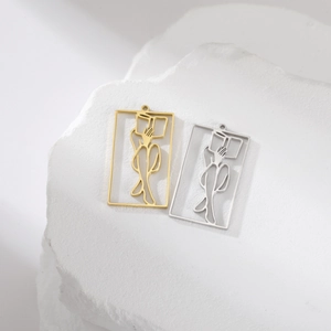 Minimalist hollow rectangle pendant set in gold and silver with abstract reading figure