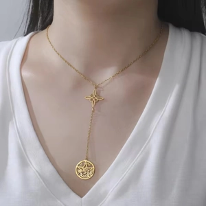 Golden Y-shaped stainless steel necklace with Celtic knot and pentagram coin pendant