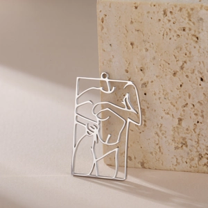 Polished rectangular stainless steel pendant featuring minimalist hollow line art silhouette
