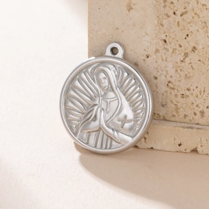 Silver stainless steel religious prayer pendant with relief on a textured stone base