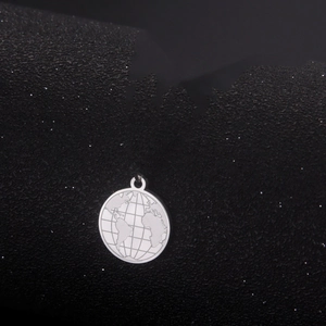 Polished stainless steel earth globe pendant with world map engraving on starry background