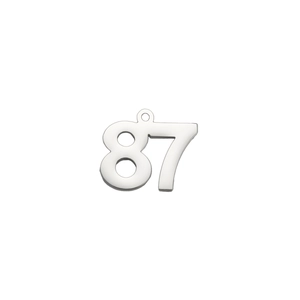 Macro shot of polished stainless steel number 87 pendant charm with high mirror finish
