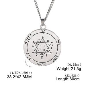Macro detail of Seal of Solomon amulet pendant showing 38.2x42.8mm dimensions and weight