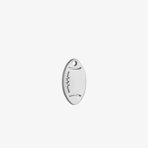 Close-up of a silver rugby-shaped metal charm with detailed stitch textures and top hole