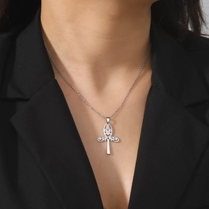 Silver hollow Ankh cross pendant necklace in stainless steel on black blazer