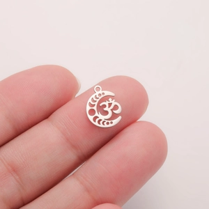 Retro stainless steel moon phase yoga Om pendant charm held for size scale