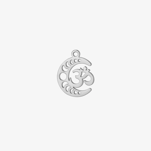 Macro detail of silver crescent moon pendant with Om symbol and lunar phase cutouts