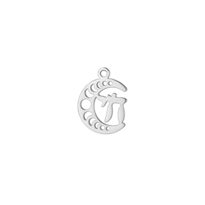 Macro detail of moon phase cutout pendant with Hebrew Chai symbol in silver steel