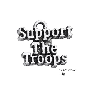 Macro view of antique silver Support The Troops charm with dimensions 17.6x17.2mm