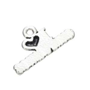 Close-up of antique silver heart pendant with hammered texture for DIY jewelry making
