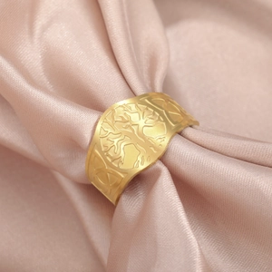 Golden Tree of Life stainless steel wide ring with Celtic patterns on pink silk